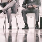 Group of well dressed business people waiting